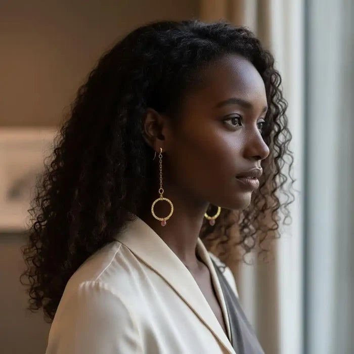 Model wearing Gold Filled Wrapped Pink Chalcedony Open Circle Earrings, showcasing elegant design and vibrant gemstone.