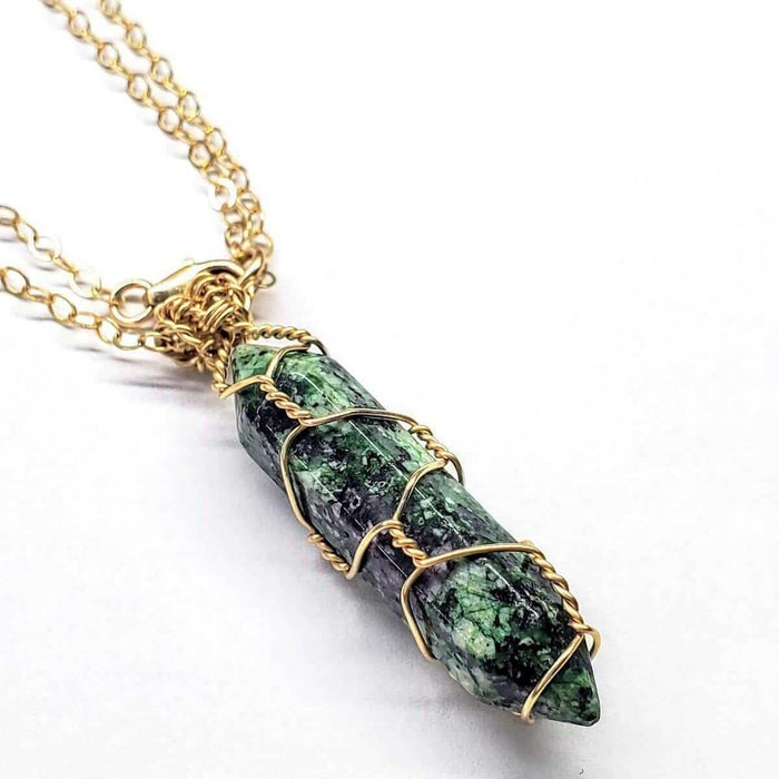 Gold Wire Caged In Ruby In Zoisite Pointed Crystal Necklace showcasing exquisite gemstone craftsmanship.