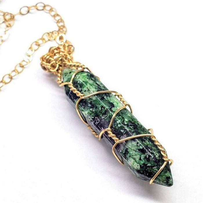 Gold Wire Caged In Ruby In Zoisite Pointed Crystal Necklace showcasing a green pointed crystal with gold wire.