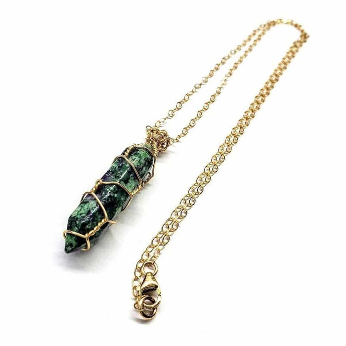 Gold Wire Caged In Ruby In Zoisite Pointed Crystal Necklace featuring a green pointed crystal with gold wire wrapping.