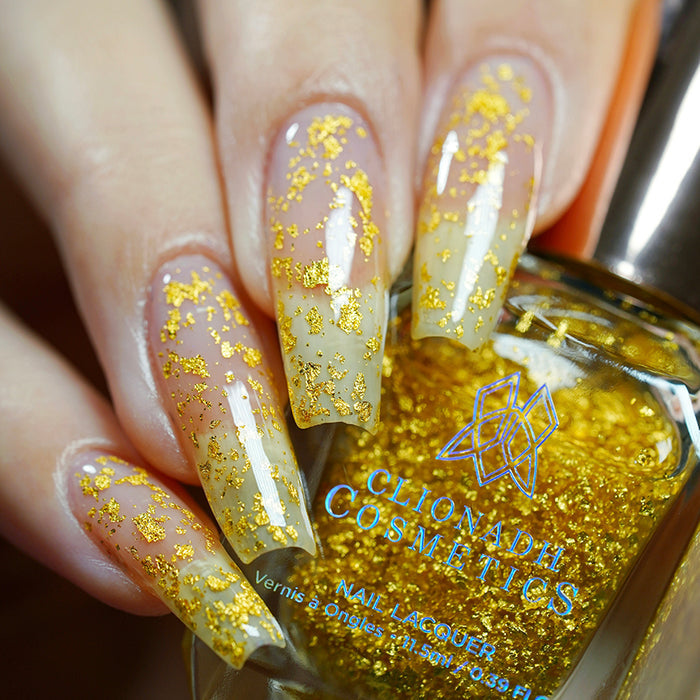 Low angled shot of long nails done with Golden Prairie Nail Lacquer on fair skin tone.