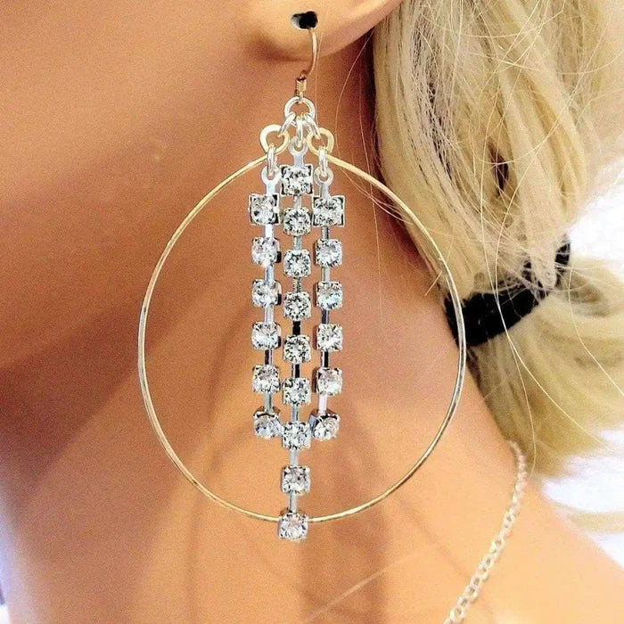 Hammered 14 K Gold Filled Oval Hoop Crystal Chain Earrings featuring sparkling crystals and elegant design.