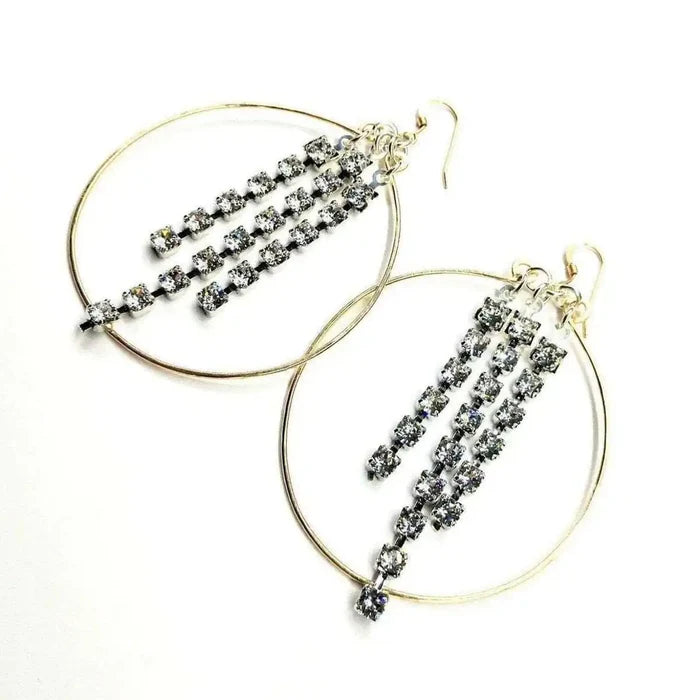 Hammered 14 K Gold Filled Oval Hoop Crystal Chain Earrings with sparkling crystal details.