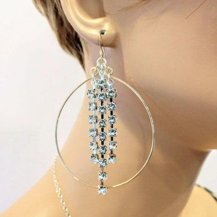 Hammered 14 K Gold Filled Oval Hoop Crystal Chain Earrings showcased on mannequin with elegant sparkling crystals.