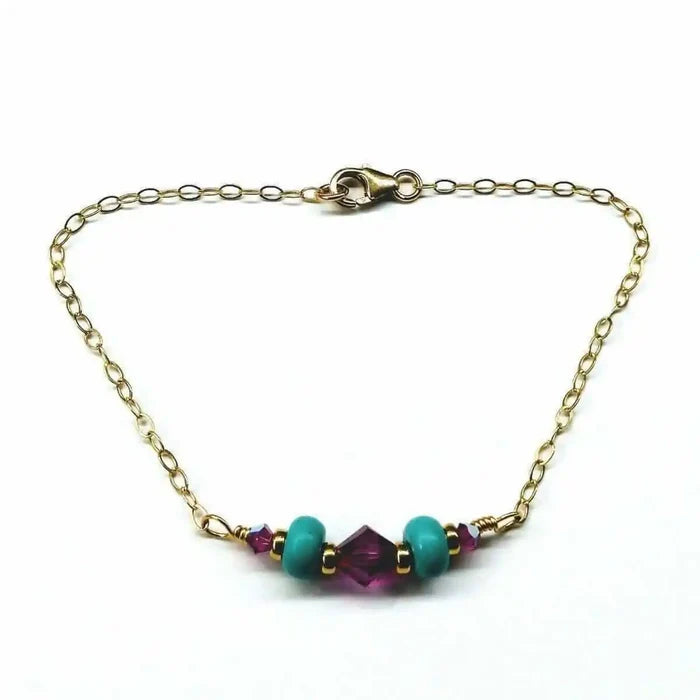 Handmade Gold Filled Pink Turquoise Gemstone Bracelet featuring turquoise beads and fuchsia Swarovski crystals.