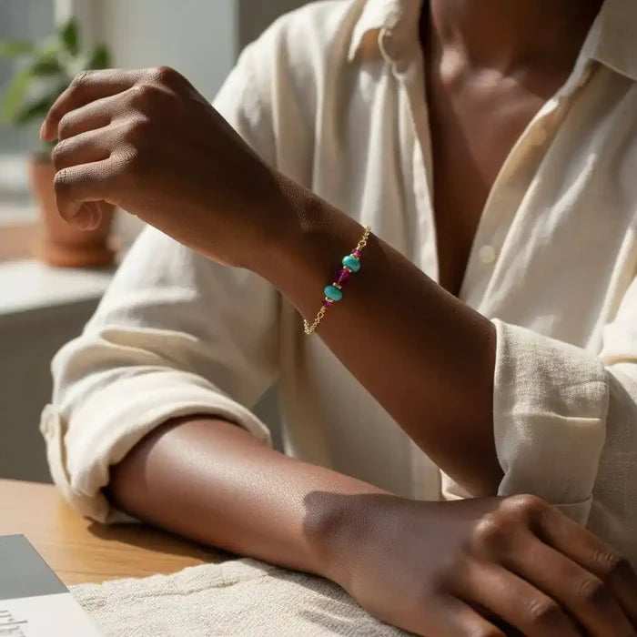 Handmade Gold Filled Pink Turquoise Gemstone Bracelet worn on a model's wrist, featuring vibrant pink and turquoise stones.