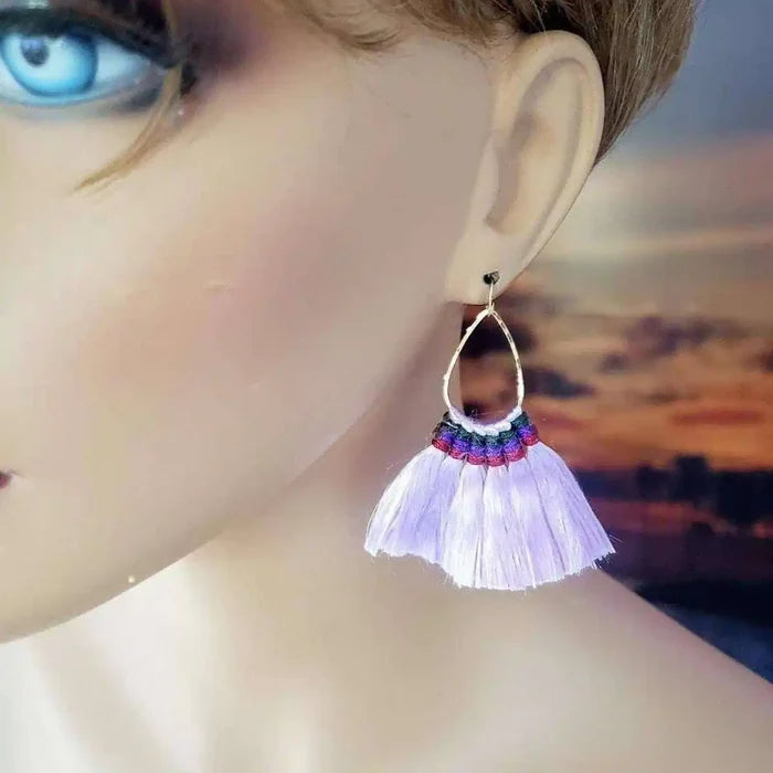 Handmade Hawaii Hula Skirt Rayon Silk Tassel Hoop Earrings showing vibrant purple tassels and hoop design.
