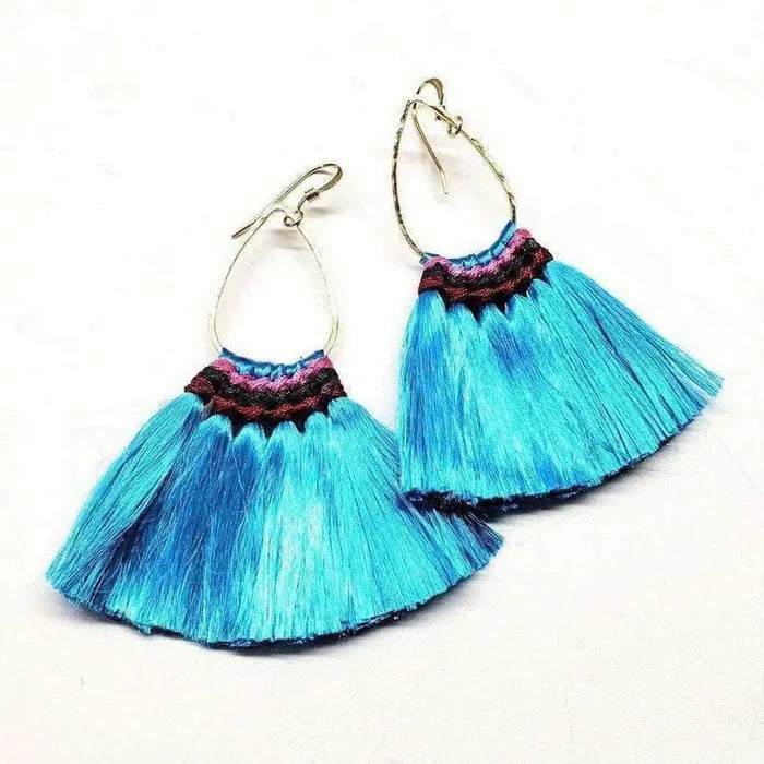 Handmade Hawaii Hula Skirt Rayon Silk Tassel Hoop Earrings featuring vibrant blue tassels and silver hoop design