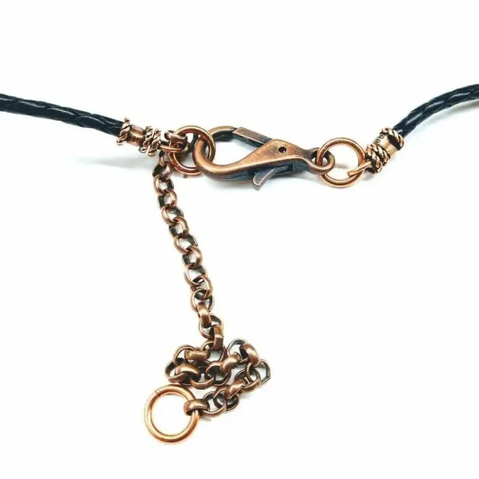Close-up of the clasp detail on the Handmade Large Copper and Silver Wire Cross Necklace for Men.