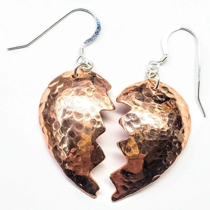 Handmade Sculpted Copper Broken Heart Earrings with a hammered finish highlighting unique artisan craftsmanship.
