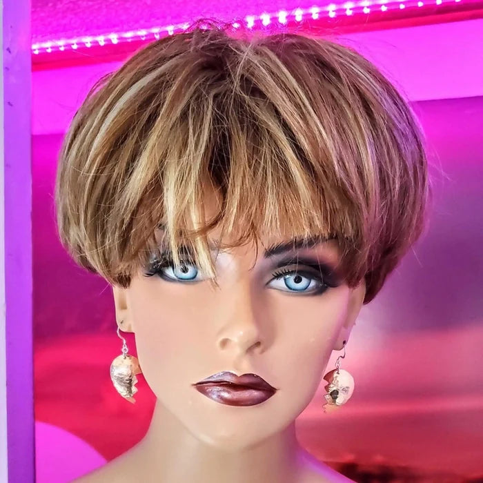 Handmade Sculpted Copper Broken Heart Earrings worn by a mannequin with short hair and bold makeup.