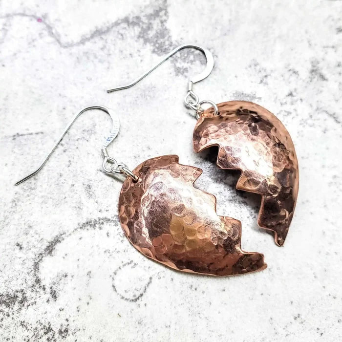 Handmade Sculpted Copper Broken Heart Earrings featuring a three-dimensional design in hammered copper.
