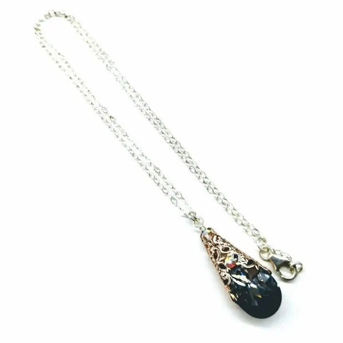 Handmade Sculpted Wrapped Rose Gold Filigree Crystal Necklace with a black diamond Swarovski crystal.