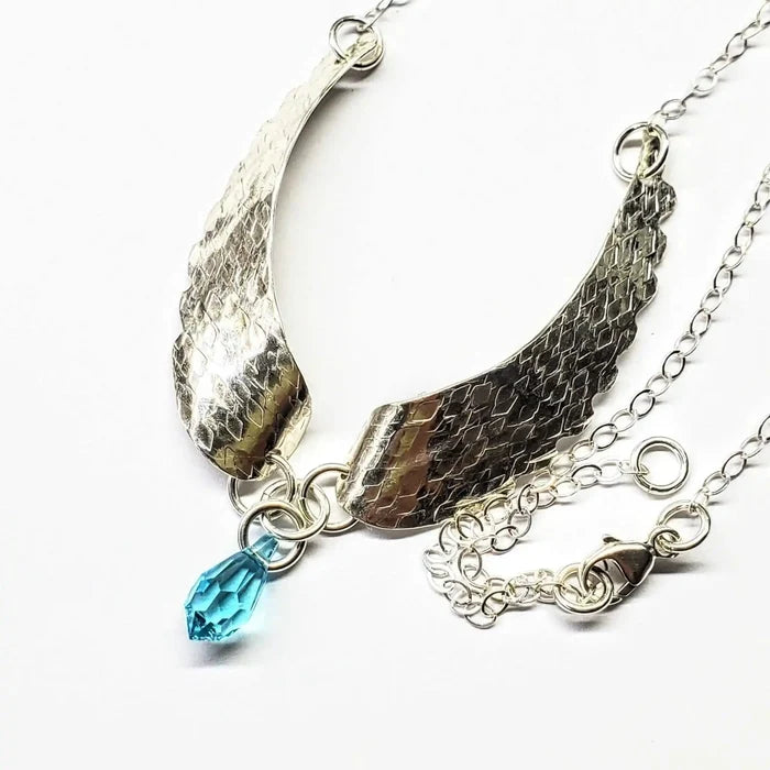 Handmade Silver Forged Sculpted Angel Wings Necklace with shimmering Swarovski crystal teardrop.