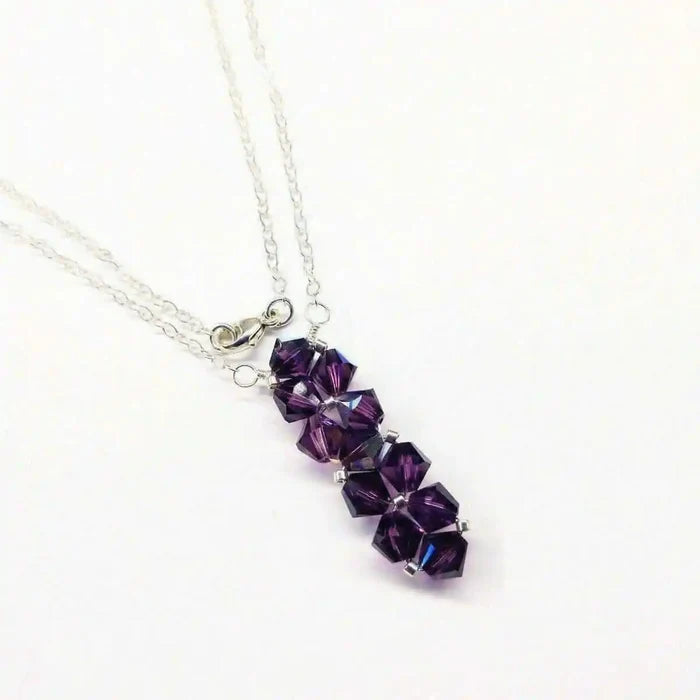 Handmade Wire Colored Woven Crystal Rock Candy Necklace featuring purple Swarovski crystal bicone pendant.