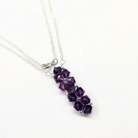 Handmade Wire Colored Woven Crystal Rock Candy Necklace featuring purple Swarovski crystal bicone pendant.