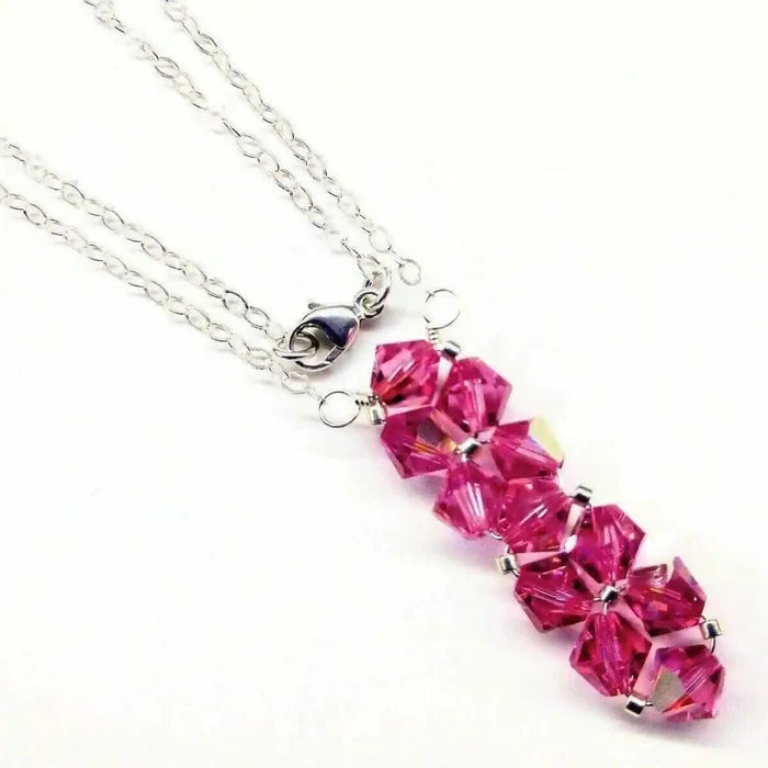 Handmade Wire Colored Woven Crystal Rock Candy Necklace featuring pink Swarovski crystal bicone pendant.