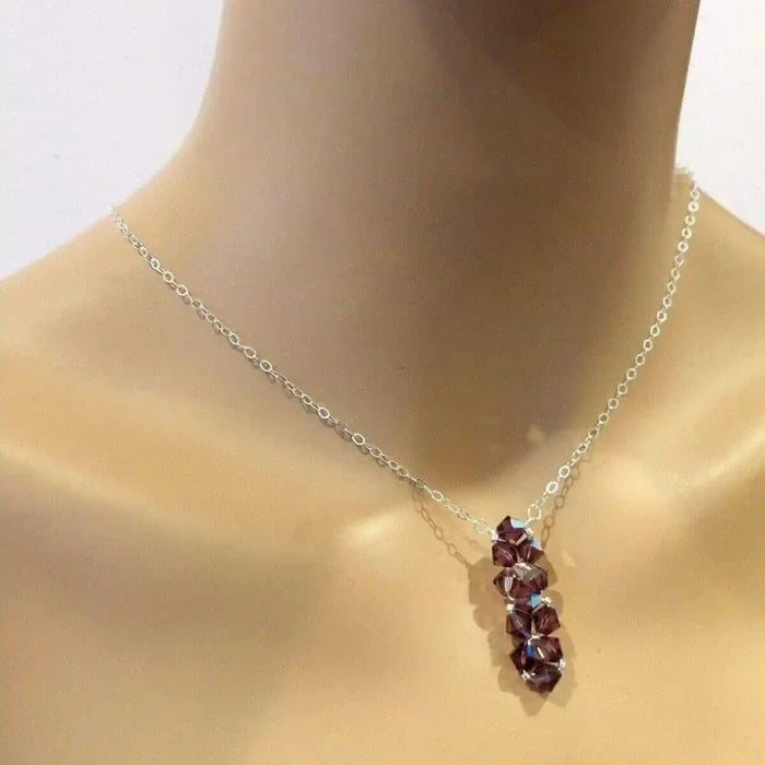 Handmade Wire Colored Woven Crystal Rock Candy Necklace featuring purple Swarovski crystal bicones on a silver chain