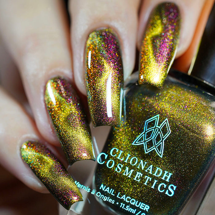 Close up shot of nails done with Hazard Nail Lacquer showing off the magnetic effect on fair skin tone
