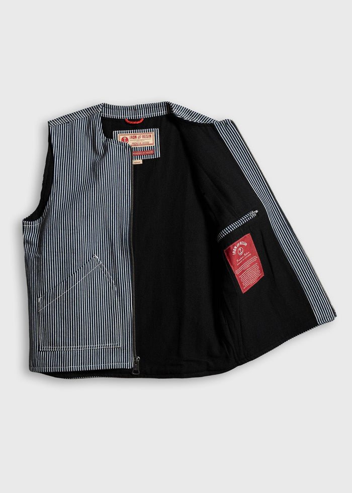 Striped vest with open front, showing black interior and red label. Features a front pocket and Iron & Resin branding inside.