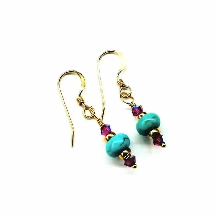 Hot Pink and Turquoise Gemstone14 K Gold Filled Earrings showcasing vibrant turquoise and hot pink Swarovski crystals.