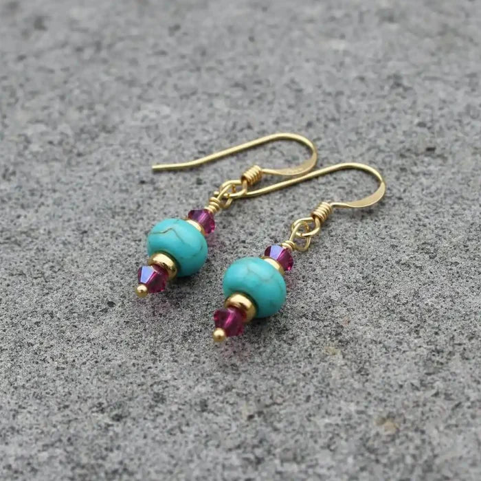 Hot Pink and Turquoise Gemstone14 K Gold Filled Earrings showcasing vibrant turquoise and pink Swarovski crystals.