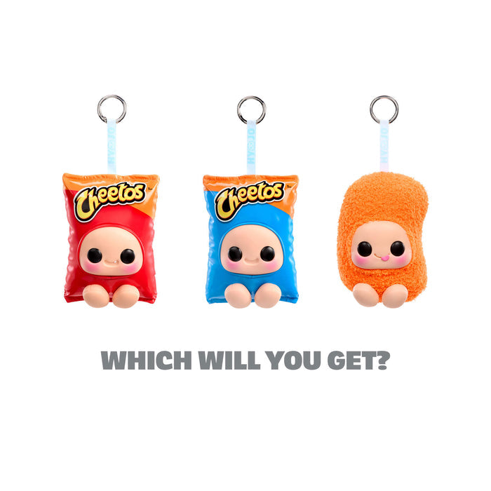 Three cartoon-style character keychains with different faces on a white background