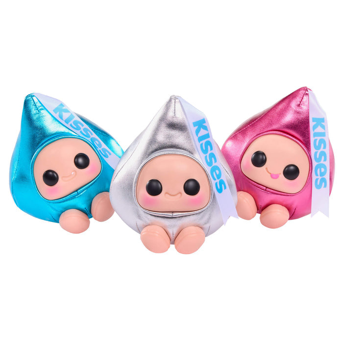 Three colorful Hersey's Kisses character toys with 'Kisses' branding on a white background