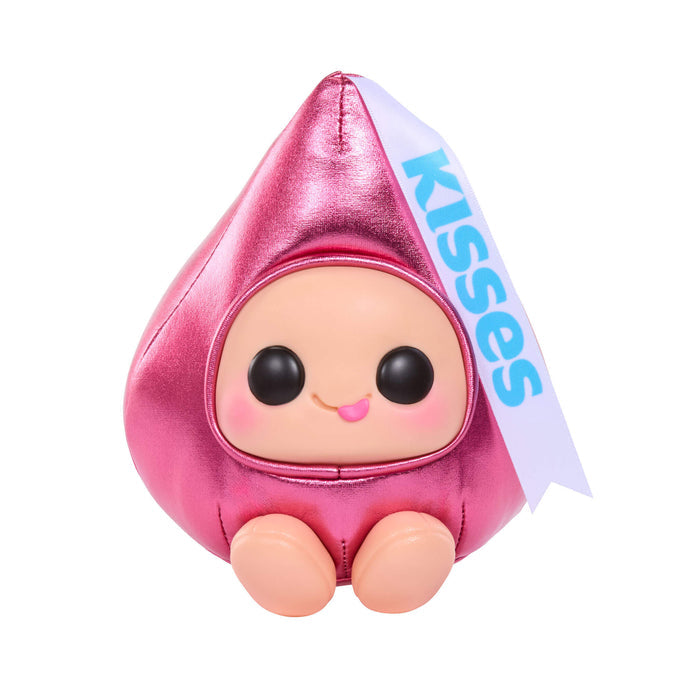 Pink plush toy with 'Kisses' label on a white background