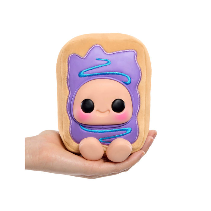 Toy resembling a Pop Tart  character with some purple color held in a hand on a white background