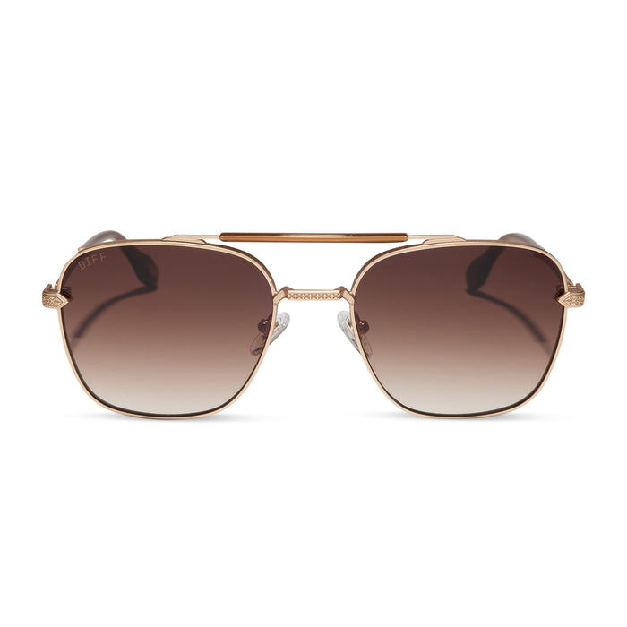 diff eyewear x stephen wilson jr. i'm a song navigator sunglasses with a gold metal frame and brown gradient lenses front view