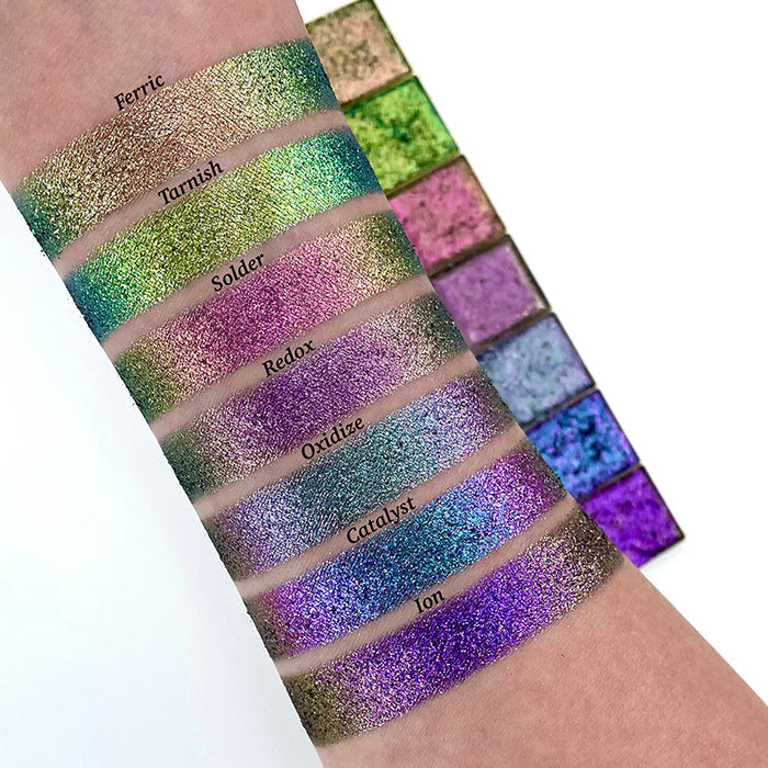 Arm swatches of Ferric, Tarnish, Solder, Redox, Oxidize, Catalyst and Ion on fair skin tone.