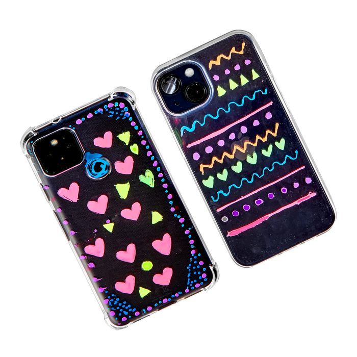 Two phone cases decorated with OOLY Jelly Gloss Neon Multi-Surface Deco Gel Pens