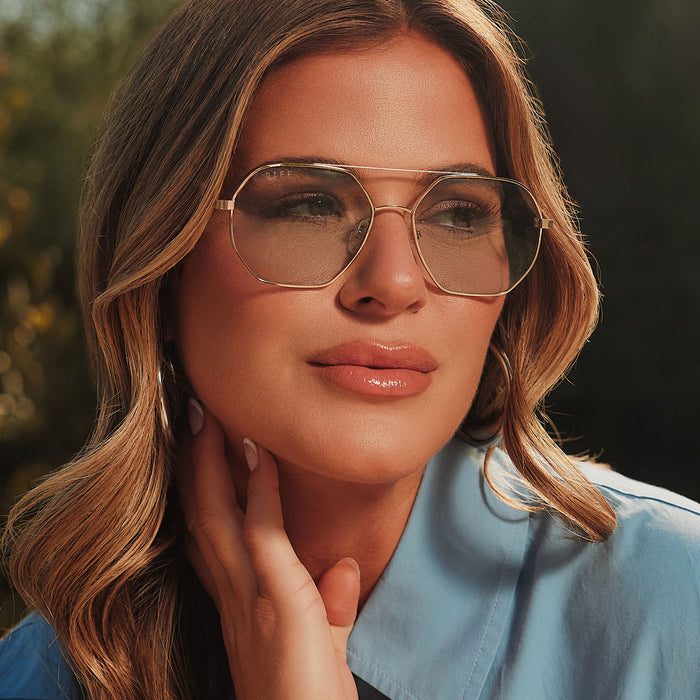 lifestyle - female jojo fletcher wearing diff eyewear joelle navigator sunglasses with a gold metal and chocolate crystal temples with grey tinted lenses