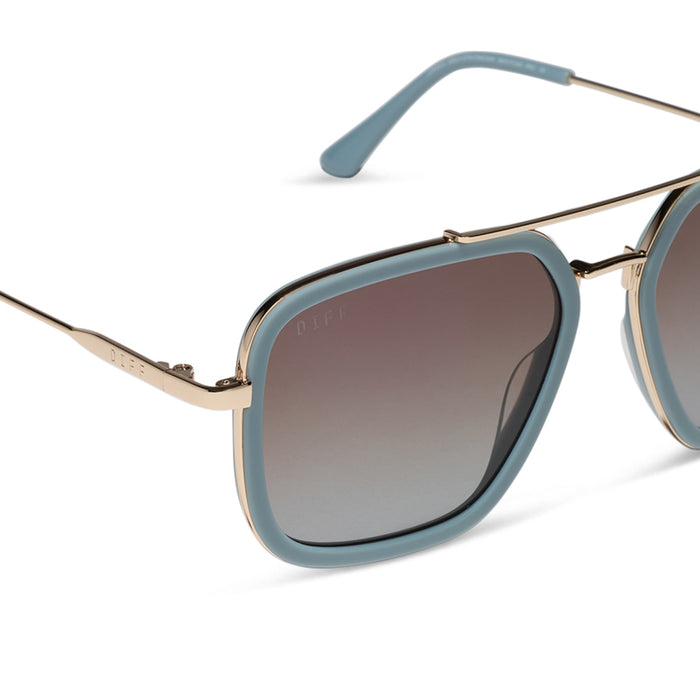 diff eyewear jordan navigator sunglasses with a dew drop and gold frame with cocoa powder to baby blue gradient lenses detailed view