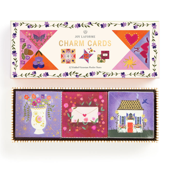 The Joy Laforme Charm Cards by Joy Laforme feature colorful illustrations—a butterfly, flower, heart, sun, and quilt blocks—and include three notecards: a flower vase, an envelope with hearts, and a house with a red door.