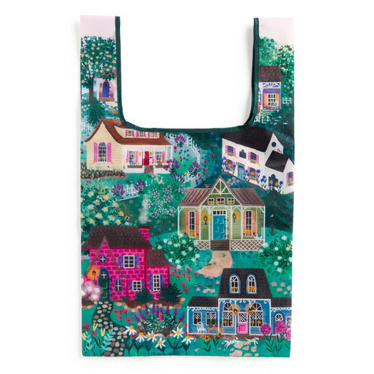 The Joy Laforme Cottage Hills Packable Nylon Tote Bag features whimsical houses, gardens, and greenery in a storybook style—crafted from eco-friendly materials.