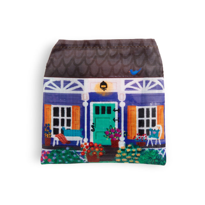 Store your Joy Laforme Cottage Hills Packable Nylon Tote Bag in this small eco-friendly pouch, decorated with Joy Laforme’s colorful cottage illustration featuring a teal door, orange shutters, flowers, and potted plants.