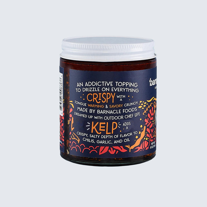 Jar of Barnacle Foods Kelp with colorful label on a light gray background