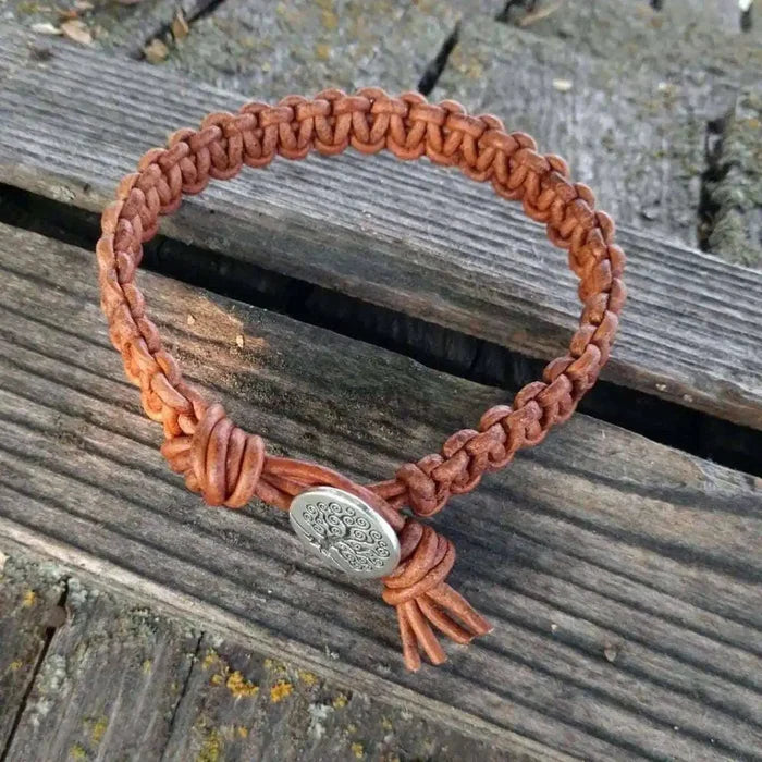 Large Mens Tree of Life Earth Color Macrame Leather Bracelet on wooden surface