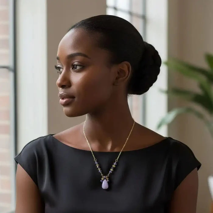 Model wearing a Lavender Candy Jade Drop Gold Wire Wrapped Necklace, showcasing its lavender-pink teardrop pendant.