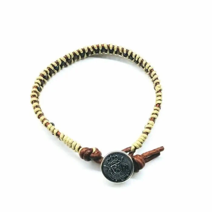 Leather Seed Bead Rattlesnake Tail Weave Bracelet featuring intricate leatherwork and rustic charm.
