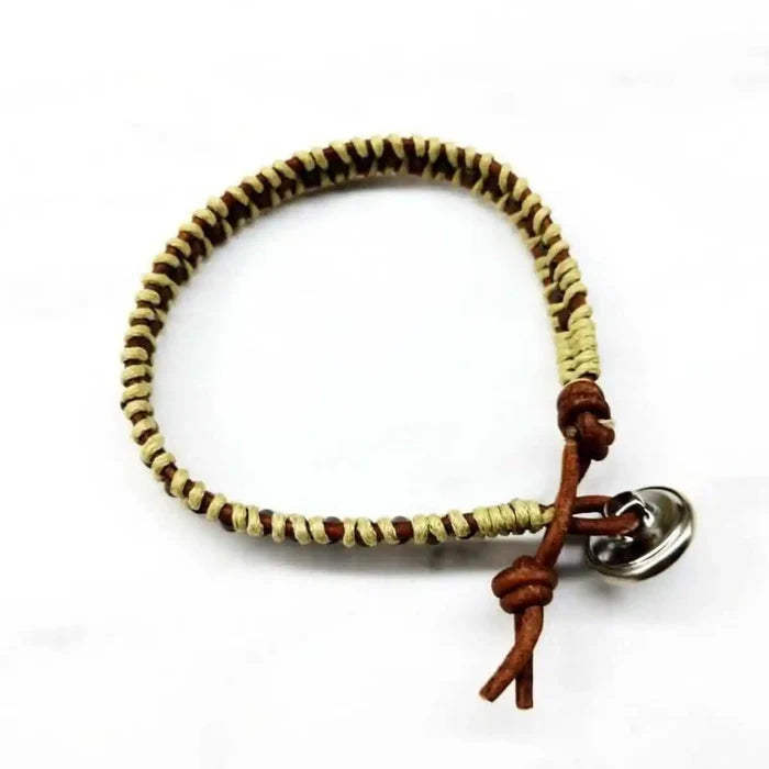 Leather Seed Bead Rattlesnake Tail Weave Bracelet showcasing intricate two-tone leather weaving pattern.