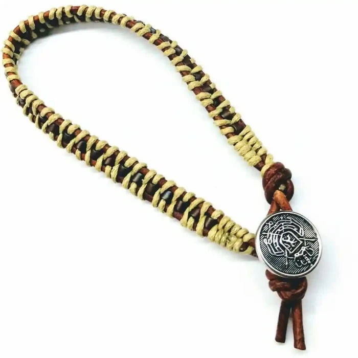 Leather Seed Bead Rattlesnake Tail Weave Bracelet featuring intricate weaving and a decorative button clasp.