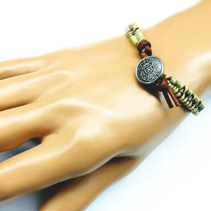 Leather Seed Bead Rattlesnake Tail Weave Bracelet displayed on a hand, showcasing intricate design and rustic elegance.