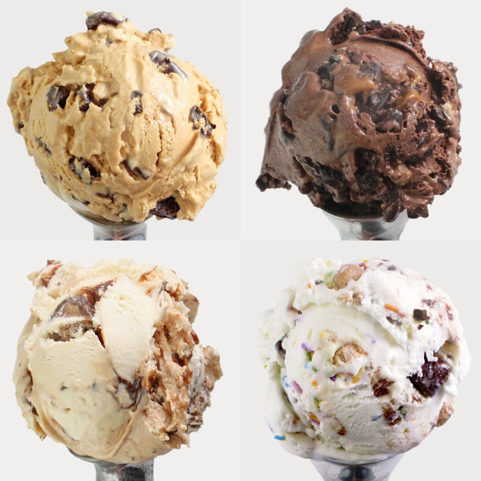 Photo of 4 different ice cream flavors on ice cream scoopers