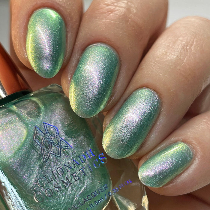 Close up of nails done with Lineage nail lacquer on fair skin tone.
