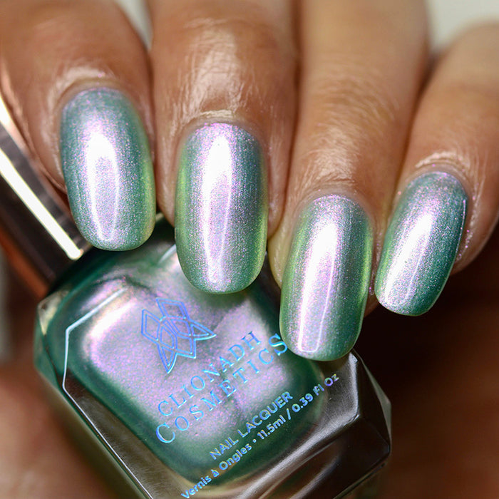 Close up of nails done with Lineage nail lacquer on medium skin tone.