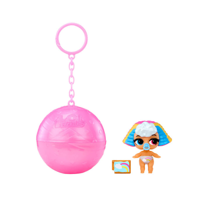 Small doll with a pink ball keychain on a white background