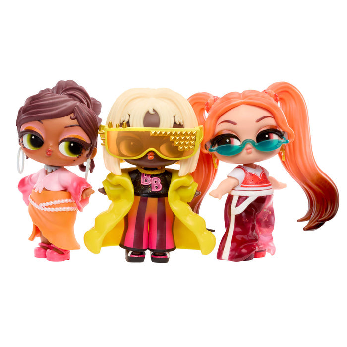 Three tots with various outfits on a white background